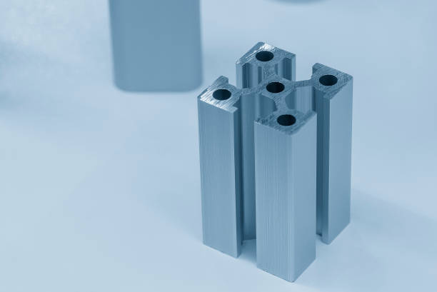 The sample of square aluminum reinforced frame from extrusion process. The aluminum profile sample parts.