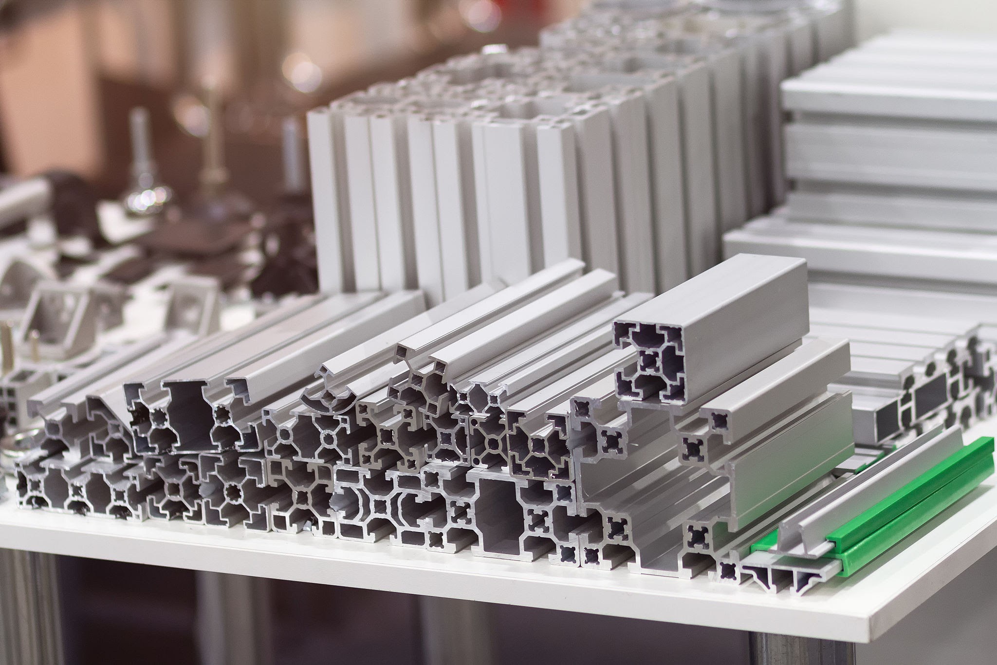 Aluminum extrusion profiles on the counter. Industry